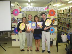 Miss Anna Maria (c-right) and her wonderful library staff.